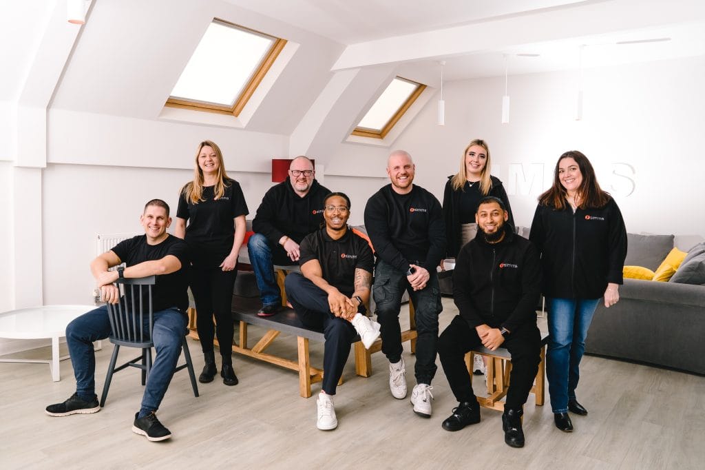Group photo of members of staff by corporate photographer, Parkershots Commercial